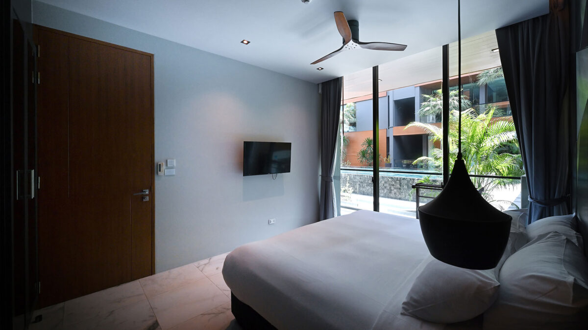 1-Bedroom Suite bedroom with pool and garden view, Glam Habitat Hotel Kamala Beach Phuket
