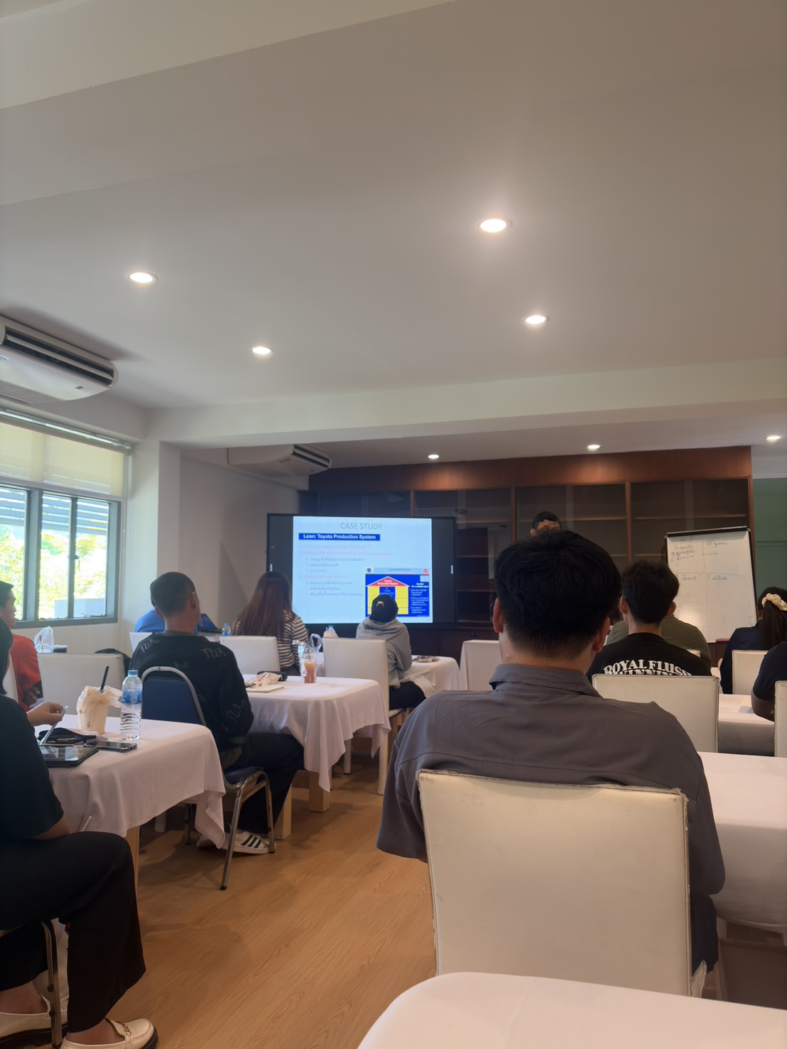 Instructor presenting Lean principles and the Toyota Production System during the Inventory Management training course