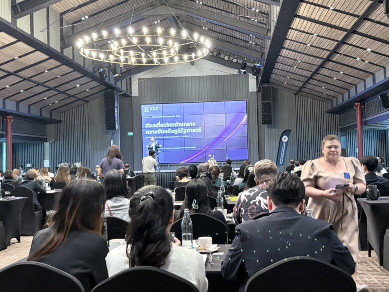 Speaker presenting on Thailand tourism amidst geopolitical conflicts at the PTA AGM 2026