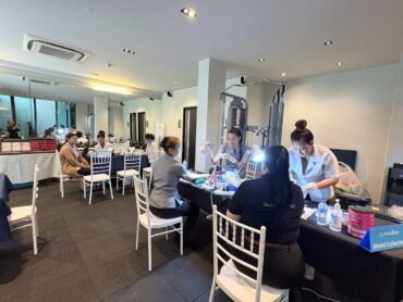 Glam Habitat team members at the blood collection tables set up by the Phuket International Hospital medical team inside the hotel