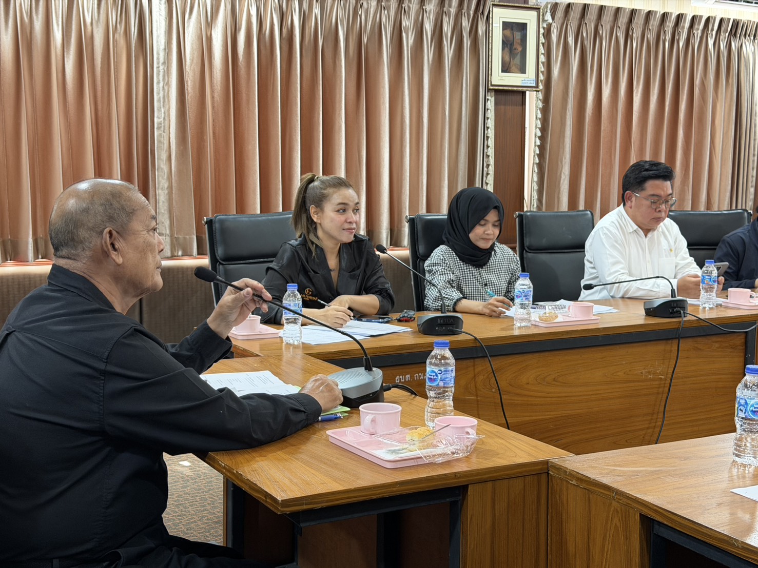 Glam Habitat Hotel's representative at the head table during the Kamala Loy Krathong 2026 planning meeting